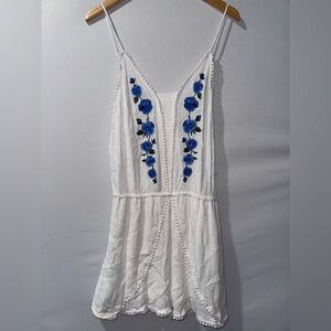 Chic White Dress with Blue Floral Accents